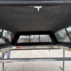 Premium LEER Mile High Deluxe topper for Ram 2500 with elevated cargo protection and secure storage. Premium LEER Mile High Deluxe topper for Ram 2500 with elevated cargo protection and secure storage.