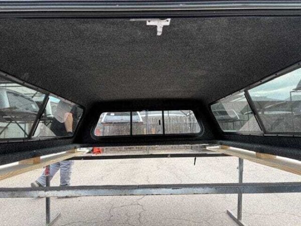 Premium LEER Mile High Deluxe topper for Ram 2500 with elevated cargo protection and secure storage. Premium LEER Mile High Deluxe topper for Ram 2500 with elevated cargo protection and secure storage.