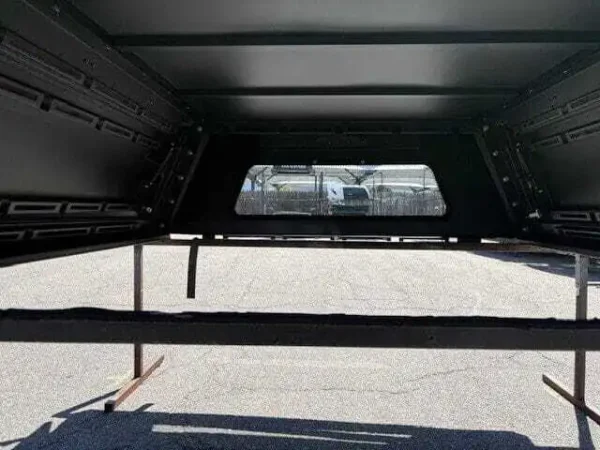 Premium OVS Expedition truck cap for Toyota Tundra with secure weather-resistant storage and rugged durability. Premium OVS Expedition truck cap for Toyota Tundra with secure weather-resistant storage and rugged durability.