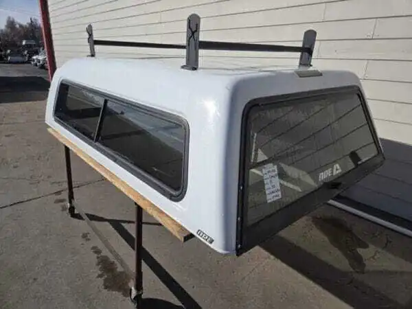 The A.R.E. MX Series topper for Chevrolet Silverado 1500 delivers secure truck bed storage, premium styling, weather-resistant protection, and dependable utility for work, travel, camping, and daily driving. The A.R.E. MX Series topper for Chevrolet Silverado 1500 delivers secure truck bed storage, premium styling, weather-resistant protection, and dependable utility for work, travel, camping, and daily driving.