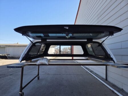 Premium LEER 100XR truck cap for Toyota Tundra with secure weather-resistant cargo protection. Premium LEER 100XR truck cap for Toyota Tundra with secure weather-resistant cargo protection.