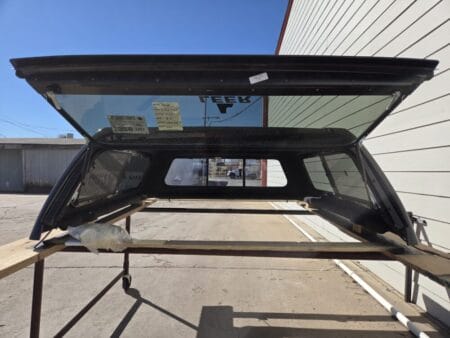 Premium LEER 100S truck cap for Toyota Tacoma with secure weather-resistant cargo protection. Premium LEER 100S truck cap for Toyota Tacoma with secure weather-resistant cargo protection.