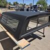 Premium LEER 100S truck cap for Nissan Frontier with secure weather-resistant storage and sleek styling. Premium LEER 100S truck cap for Nissan Frontier with secure weather-resistant storage and sleek styling.
