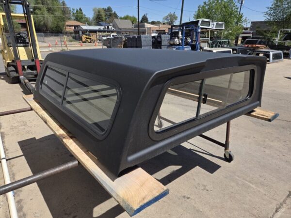 Premium LEER 100S truck cap for Nissan Frontier with secure weather-resistant storage and sleek styling. Premium LEER 100S truck cap for Nissan Frontier with secure weather-resistant storage and sleek styling.