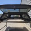 Premium LEER 100S truck cap for Nissan Frontier with secure weather-resistant storage and sleek styling. Premium LEER 100S truck cap for Nissan Frontier with secure weather-resistant storage and sleek styling.