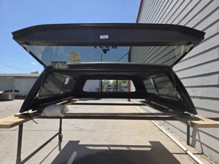 Premium LEER 100S truck cap for Nissan Frontier with secure weather-resistant storage and sleek styling. Premium LEER 100S truck cap for Nissan Frontier with secure weather-resistant storage and sleek styling.