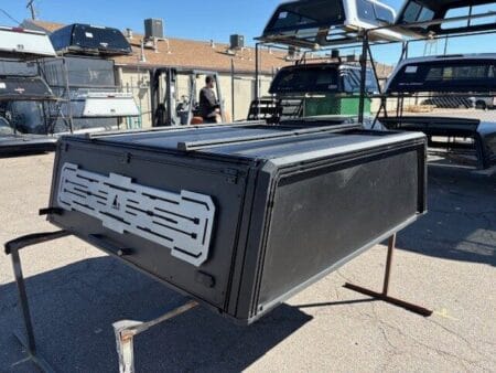 Premium LEER NEXCAP truck cap for Ford F150 with sleek styling and secure cargo protection.
