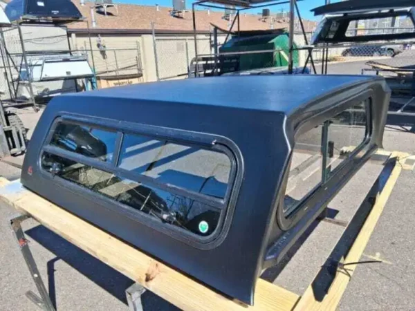 Premium LEER 100S Mile High Deluxe topper for Toyota Tacoma with elevated cargo protection. Premium LEER 100S Mile High Deluxe topper for Toyota Tacoma with elevated cargo protection.