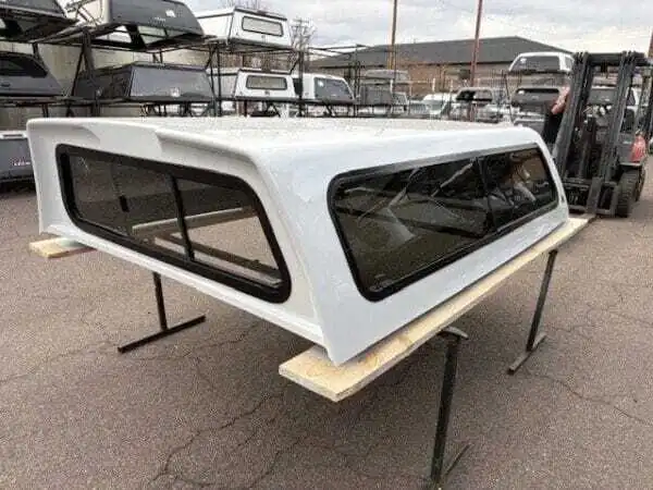 Premium LEER Mile High Deluxe topper for Ram 2500 with elevated cargo protection and secure storage. Premium LEER Mile High Deluxe topper for Ram 2500 with elevated cargo protection and secure storage.