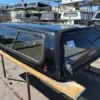 Premium LEER Mile High Deluxe topper for Toyota Tundra with elevated cargo protection and secure storage. Premium LEER Mile High Deluxe topper for Toyota Tundra with elevated cargo protection and secure storage.