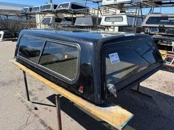 Premium LEER Mile High Deluxe topper for Toyota Tundra with elevated cargo protection and secure storage. Premium LEER Mile High Deluxe topper for Toyota Tundra with elevated cargo protection and secure storage.