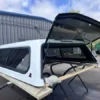 Ford F250 topper, ARE V Series truck cap, Ford F-250 camper shell, fiberglass truck topper, truck bed cap, cargo protection, pickup truck accessories