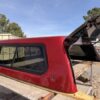 Premium LEER 100XR truck cap for Ford F150 with secure weather-resistant cargo protection.