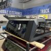 Premium RSI SmartCap EVOa Adventure topper for Toyota Tacoma with rugged overland cargo protection.