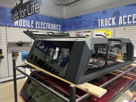 Premium RSI SmartCap EVOa Adventure topper for Toyota Tacoma with rugged overland cargo protection.