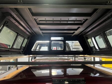 Premium RSI SmartCap EVOa Adventure topper for Toyota Tacoma with rugged overland cargo protection.