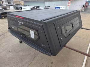 Alu-Cab Contour Canopy Topper Toyota Tundra, Toyota Tundra canopy topper, Toyota Tundra truck cap, aluminum truck canopy, premium truck topper, secure truck bed storage, weatherproof truck topper, overland truck canopy, Toyota Tundra bed cover, rugged truck accessory, camping truck topper, adventure truck canopy, truck bed protection, cargo security canopy, lightweight aluminum canopy, truck bed canopy for Tundra, off-road truck topper, work truck canopy, Toyota Tundra accessory