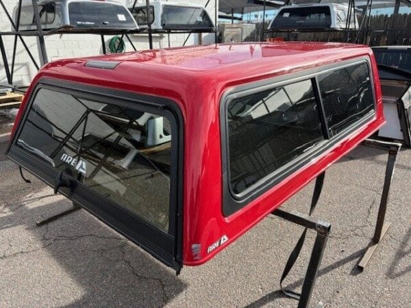 The A.R.E. CX Series topper for Toyota Tacoma delivers secure truck bed storage, premium fiberglass durability, and dependable weather-resistant protection for work, camping, overlanding, and daily driving. The A.R.E. CX Series topper for Toyota Tacoma delivers secure truck bed storage, premium fiberglass durability, and dependable weather-resistant protection for work, camping, overlanding, and daily driving.