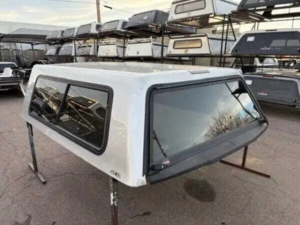 The A.R.E. V-Series topper for Nissan Titan delivers premium frameless styling, secure truck bed storage, and dependable weather-resistant protection for work, travel, camping, and daily driving.