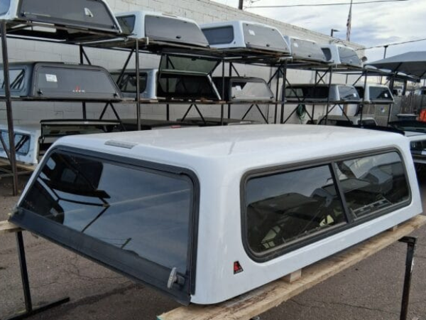 The LEER 100R topper for Chevrolet Silverado 2500 delivers secure truck bed storage, premium fiberglass durability, and dependable weather-resistant protection for work, travel, camping, and heavy-duty daily use. The LEER 100R topper for Chevrolet Silverado 2500 delivers secure truck bed storage, premium fiberglass durability, and dependable weather-resistant protection for work, travel, camping, and heavy-duty daily use.