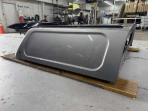 Premium LEER 100XR truck cap for Chevrolet trucks with secure cargo storage, weather protection, and factory-style durability.