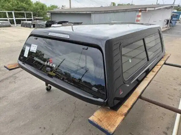 Toyota Tundra topper, LEER 100XR truck cap, Toyota Tundra camper shell, fiberglass truck topper, truck bed cap, cargo protection, pickup truck accessories