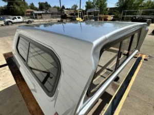 LEER 100XR Truck Topper for Toyota Tacoma Toyota Tacoma with LEER 100XR truck cap Tacoma camper shell installed Premium Toyota Tacoma truck topper LEER truck cap for Toyota Tacoma cargo protection