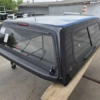 Toyota Tundra topper, LEER 100S truck cap, Toyota Tundra camper shell, fiberglass truck topper, truck bed cap, cargo protection, pickup truck accessories Premium LEER 100S truck cap for Toyota Tundra with secure storage and weather-resistant durability.