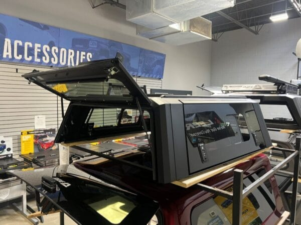 Premium RSI SmartCap EVOa Adventure topper for Toyota Tacoma with rugged overland cargo protection.
