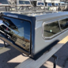 Premium LEER 100XR truck cap for Toyota Tacoma with secure weather-resistant cargo protection.