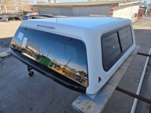 Premium LEER 100XR truck cap for Toyota Tundra with secure weather-resistant cargo protection.