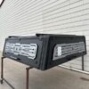 Premium LEER NEXCAP truck cap for Ford F150 with sleek styling and secure cargo protection.