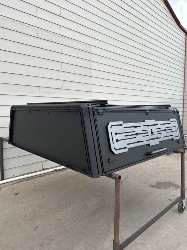 Premium LEER NEXCAP truck cap for Ford F150 with sleek styling and secure cargo protection.