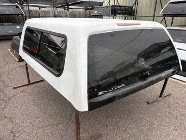 The A.R.E. CX Series topper for Toyota Tacoma delivers secure truck bed storage, premium fiberglass durability, and dependable weather-resistant protection for work, camping, overlanding, and daily driving.