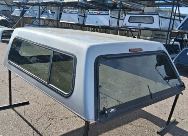 The Jason Cab Hi topper for Ford F250 delivers secure truck bed storage, dependable weather protection, and durable fiberglass construction for work, travel, camping, and everyday use. The Jason Cab Hi topper for Ford F250 delivers secure truck bed storage, dependable weather protection, and durable fiberglass construction for work, travel, camping, and everyday use.