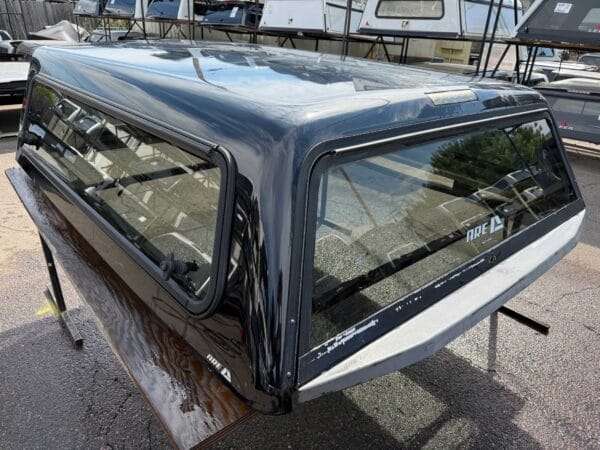 The A.R.E. V Series topper for Ford F150 delivers secure truck bed storage, premium fiberglass durability, and dependable weather-resistant protection with modern aerodynamic styling.