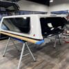 The LEER 100XQ topper for GMC Sierra 1500 delivers secure cargo storage, framed glass design, premium fiberglass durability, and weather-resistant protection for everyday use.