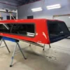 The A.R.E. V Series topper for Ford F150 delivers secure truck bed storage, premium fiberglass durability, and sleek aerodynamic styling for work and everyday use.