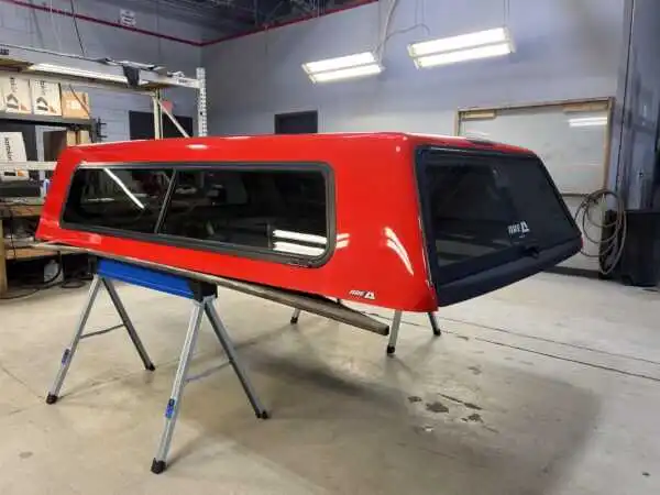 The A.R.E. V Series topper for Ford F150 delivers secure truck bed storage, premium fiberglass durability, and sleek aerodynamic styling for work and everyday use.