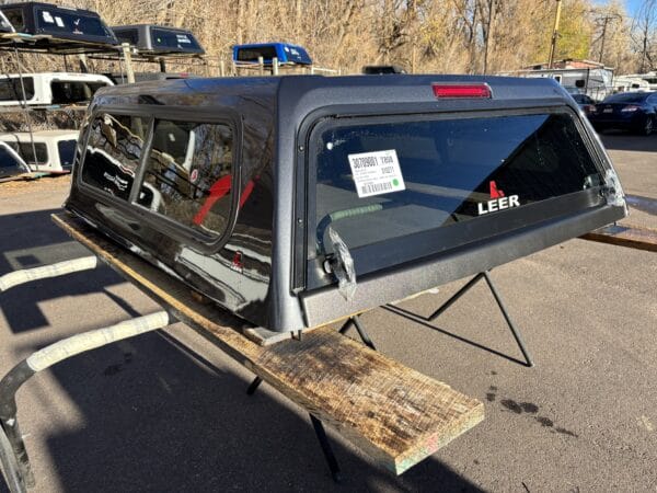 The LEER 100S topper for Toyota Tacoma provides secure truck bed storage, premium fiberglass construction, and dependable weather-resistant protection for work, camping, overlanding, and everyday adventures. The LEER 100S topper for Toyota Tacoma provides secure truck bed storage, premium fiberglass construction, and dependable weather-resistant protection for work, camping, overlanding, and everyday adventures.