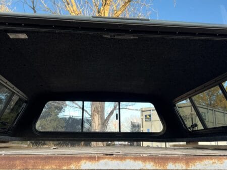 The A.R.E. CX Series topper for GMC Sierra 1500 delivers secure truck bed storage, premium fiberglass durability, and dependable weather-resistant protection for work, travel, camping, and daily driving. The A.R.E. CX Series topper for GMC Sierra 1500 delivers secure truck bed storage, premium fiberglass durability, and dependable weather-resistant protection for work, travel, camping, and daily driving.