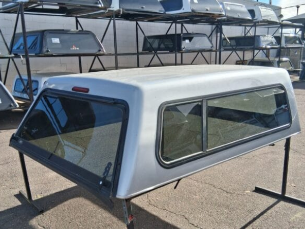 The Jason Cab Hi topper for Ford F250 delivers secure truck bed storage, dependable weather protection, and durable fiberglass construction for work, travel, camping, and everyday use. The Jason Cab Hi topper for Ford F250 delivers secure truck bed storage, dependable weather protection, and durable fiberglass construction for work, travel, camping, and everyday use.