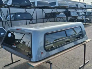 The LEER 100S topper for GMC Sierra 2500 delivers secure truck bed storage, premium fiberglass construction, and dependable weather-resistant protection for work, towing, travel, and outdoor adventures.