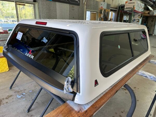 The A.R.E. DCU topper for Ford F350 delivers commercial-grade security, organized equipment storage, and dependable weather-resistant protection for contractors, fleets, and service professionals.