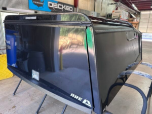 The A.R.E. DCU topper for Ford F250 delivers commercial-grade aluminum construction, secure tool storage, and dependable weather-resistant protection for contractors, fleets, and heavy-duty work applications.