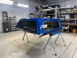 The Ranch Sierra Xtra topper for Toyota Tacoma provides secure truck bed storage, premium fiberglass durability, and weather-resistant protection for work, camping, and daily driving.