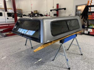 The A.R.E. V Series topper for GMC Sierra 1500 provides secure truck bed storage, premium fiberglass durability, and aerodynamic styling for work, travel, and everyday use.